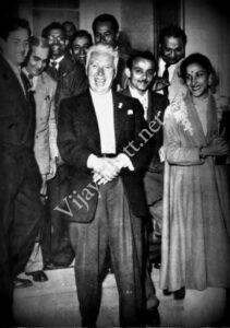 Vijay Bhatt visits Charlie Chaplin with other film personalities.